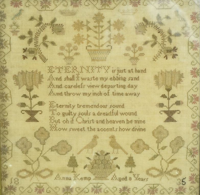 An 18th century sampler dated 1797 by Ann Howse, worked with fine floral garland and a large embroidered flower and verse within, together with two 19th century samplers, one by Anna Kemp age 8 years dated 1835, the othe